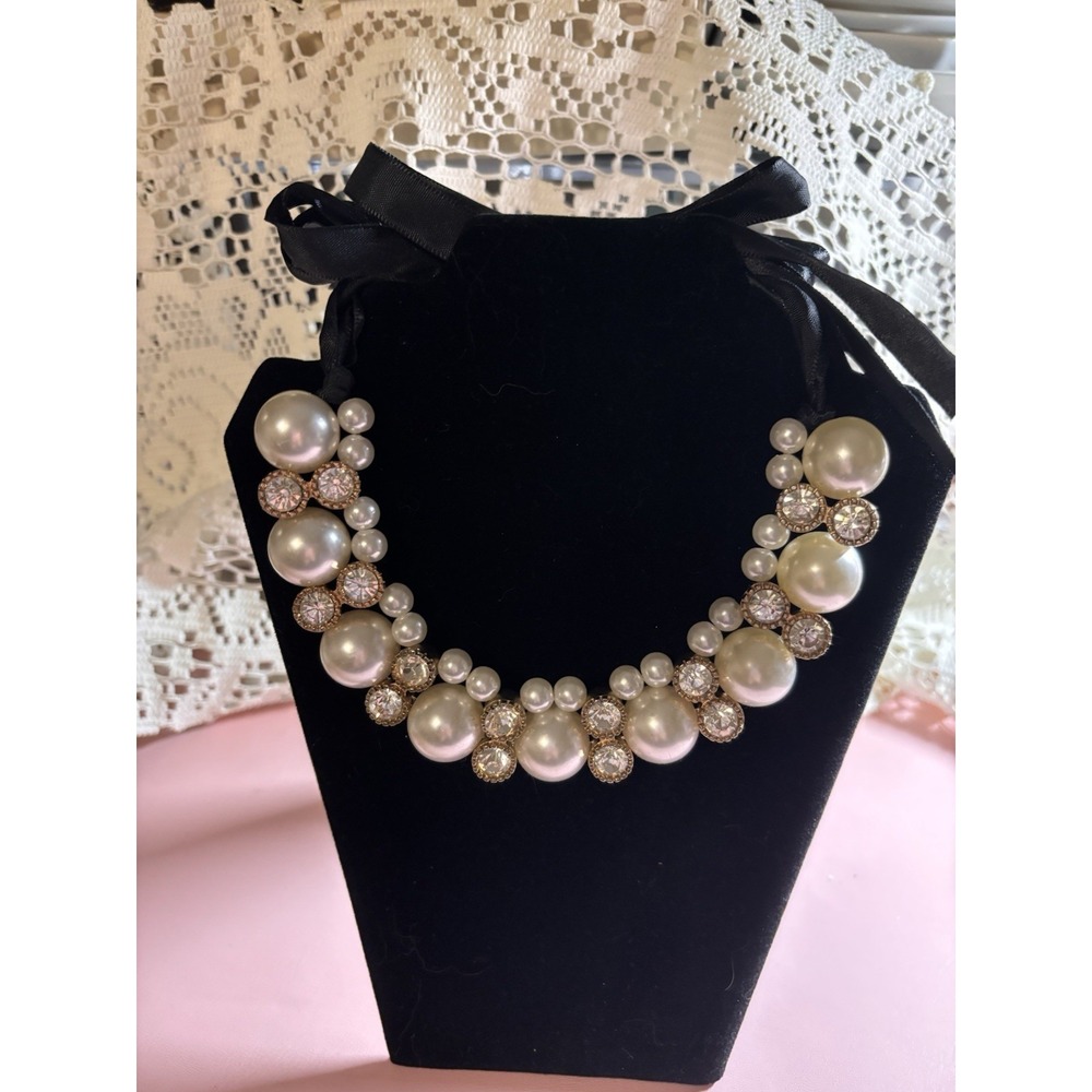 Faux Pearl Necklace With Rhinestones Set In Gold With Black Ties. Adjustable.